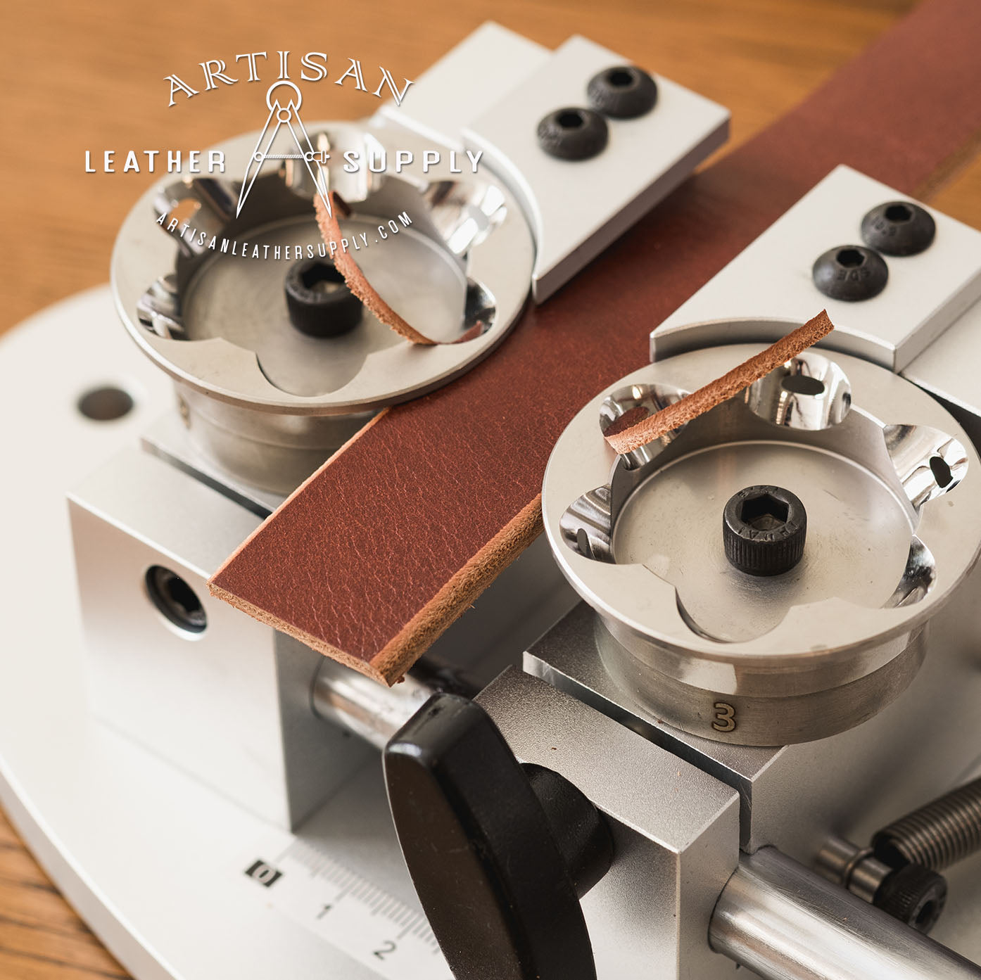 The Strap Edge Pro beveler being used to trim the edge of a vegetable-tanned leather belt.